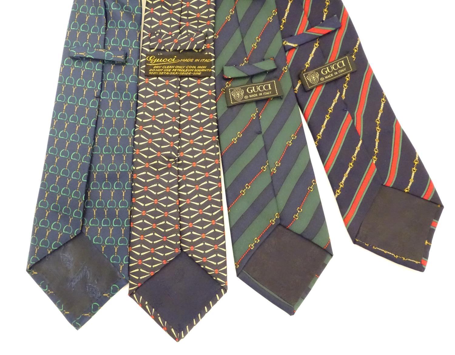 4 Gucci silk ties, various designs in greens, black and blues (4) Please Note - we do not make - Image 5 of 7