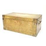 An early to mid 20thC hardwood box with brass carrying handles and brass mounts to the corners