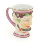 A Victorian Staffordshire character mug modeled as Bacchus. Approx. 4" high Please Note - we do