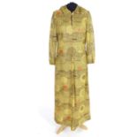 A bespoke vintage ladies gold lurex evening dress with hood c1960's. Gold with abstract patterns.
