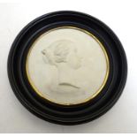 A French 19thC Sevres bisque porcelain / parian ware medallion depicting a profile portrait bust