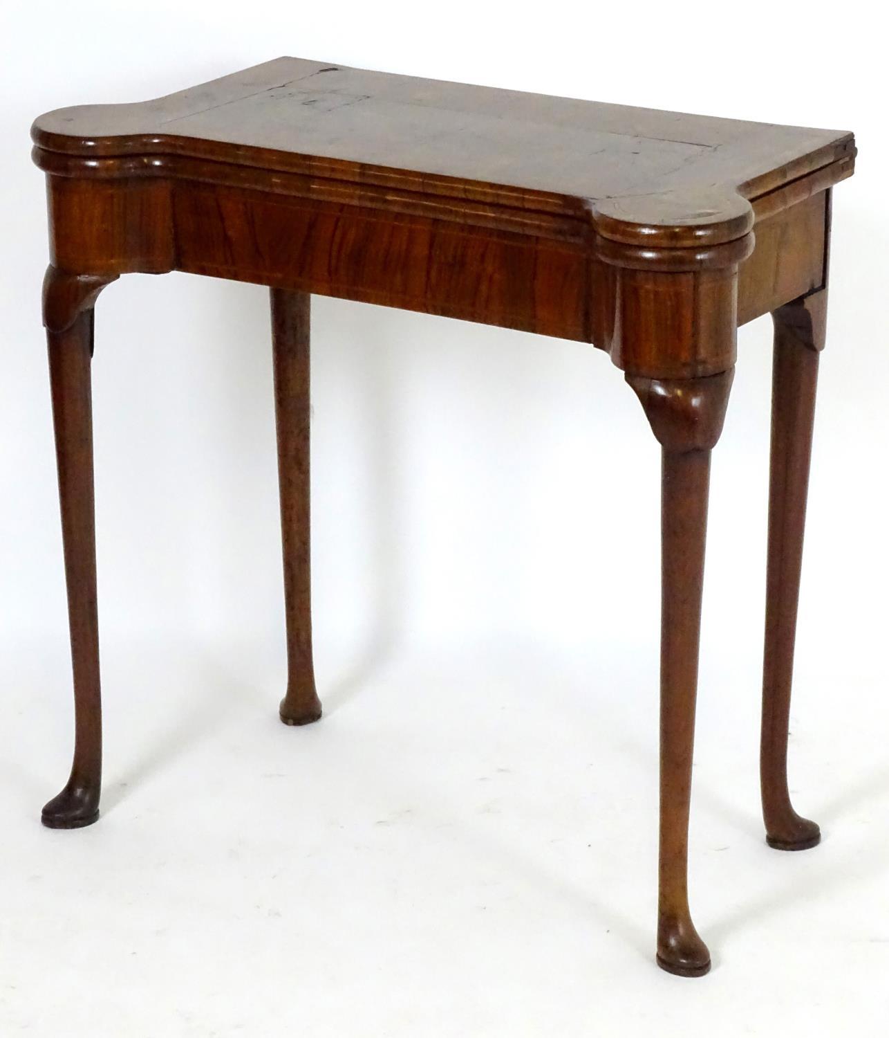 A George I walnut card table with castellated corners, opening to show a baize playing surface and - Bild 10 aus 10