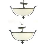 A pair of ceiling lights with frosted glass domed shades and metal strap work 18" diameter Please