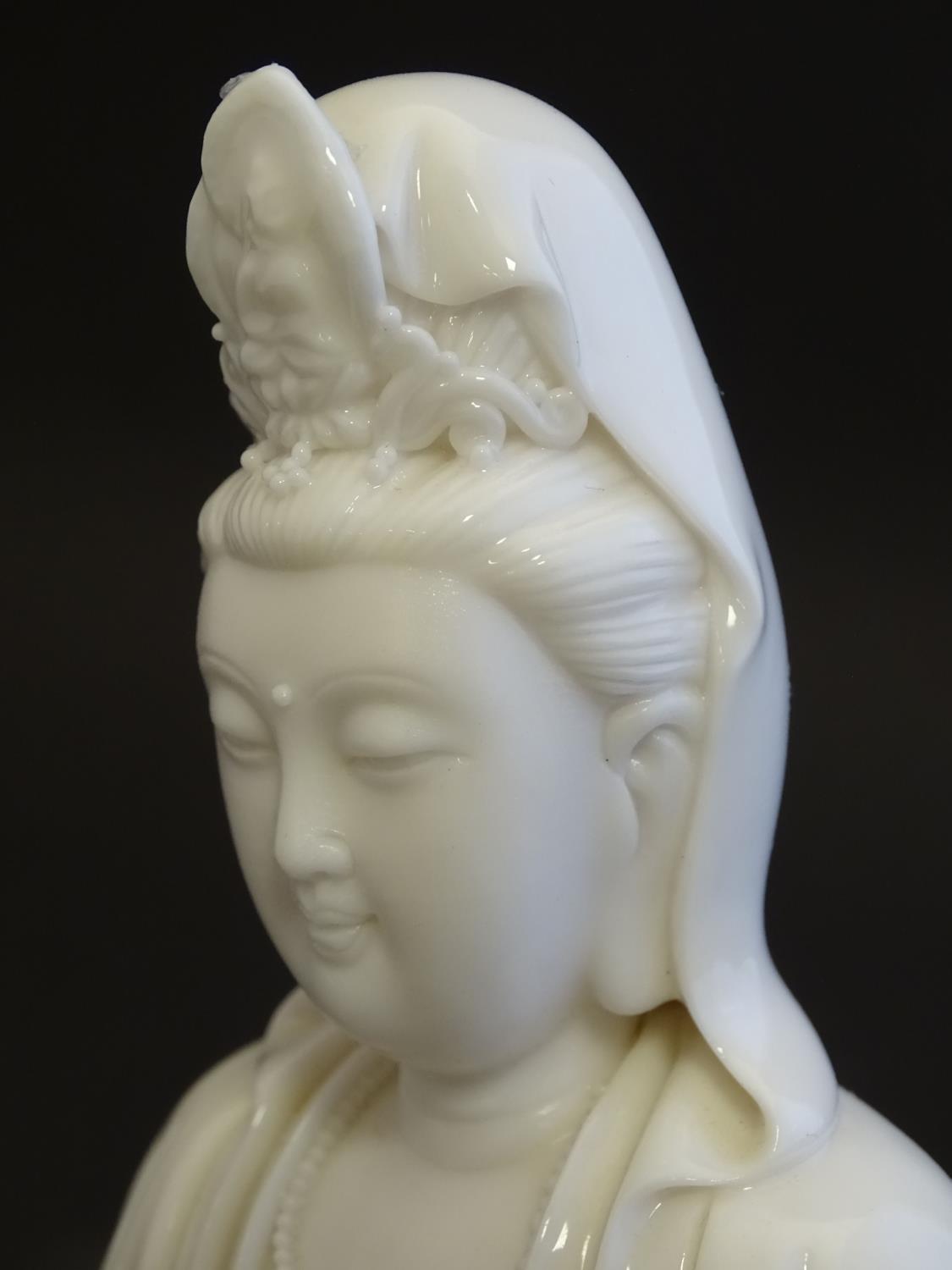 A Chinese blanc de chine figure depicting Guanyin seated on a lotus flower base. Approx. 7 1/2" high - Image 14 of 16
