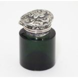 A Victorian green glass scent / salts bottle with silver mount and lid, Birmingham 1898 Approx 1 1/