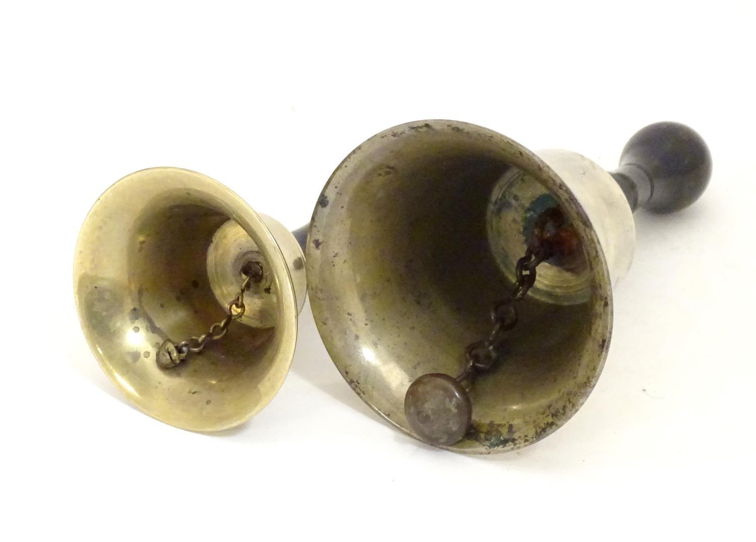 Two early 20thC brass hand bells with ebonised and turned handles. Largest approx. 7" high (2) - Image 5 of 5