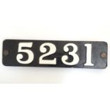 A cast metal and painted number plaque 5231. Approx. 5 3/4" x 22" Please Note - we do not make