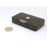 A 19thC snuff box with lacquer finish resembling faux agate bloodstone with yellow metal mounts.