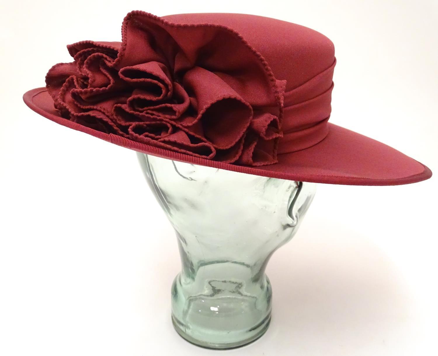 A ladies red hat by Kangol Please Note - we do not make reference to the condition of lots within - Image 4 of 7