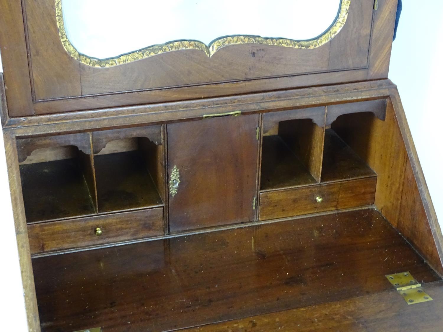 A Regency mahogany bureau bookcase with a moulded cornice above a dentil frieze and shaped - Bild 8 aus 14