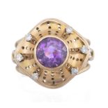 Bague en or rose .585 avec une améthyste facettée ronde et 6 diamants 8/8 pour un [...]