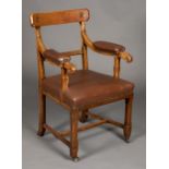 * Chair. A Victorian Gothic carved oak chair in the manner of Pugin