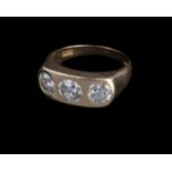 * Ring. An 18ct gold 3 stone diamond ring