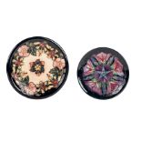 * Moorcroft. Two Moorcroft pottery floral decorated plates