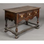 * Table. An early 18th century oak side table