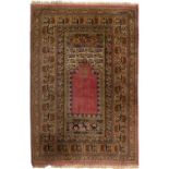 * Carpet. A Turkish prayer rug, Hereke, circa 1930s