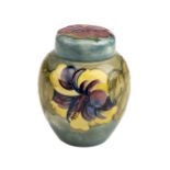 * Moorcroft. A Moorcroft pottery 'Hibiscus' pattern ginger jar and cover