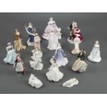 * Figurines. A large collection of Royal Doulton and Royal Worcester figurines