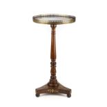 * Table. An early 19th century and later simulated rosewood occasional table