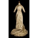* Dress. A satin wedding dress, circa 1890
