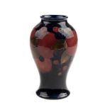* Moorcroft. A Moorcroft pottery 'Pomegranate' pattern vase