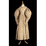 * Dress. A printed cotton day dress, 1830s