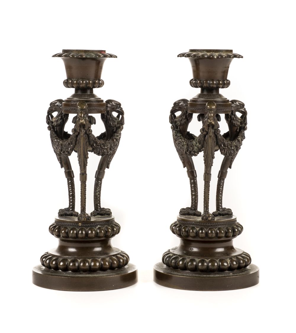 * Candlesticks. A pair of 19th century French bronze candlesticks