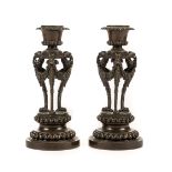 * Candlesticks. A pair of 19th century French bronze candlesticks