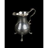 * Creamer. A George II silver creamer by Walter Brind, London 1759