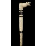 * Walking Stick. A 19th century whale bone walking stick