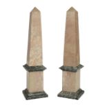 * Obelisks. A pair of modern marble obelisks