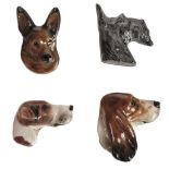 * Royal Doulton. A collection of dog brooches