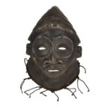* Congo. A Kuba wooden mask