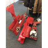 * Model Aircraft. Two large scale models of the Red Baron's Fokker Triplane