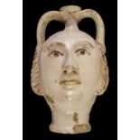 * Flask. A novelty flask in the form of a mans head, probably 19th century