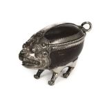 * Tibetan. A 19th century silver and coconut "monster" casket