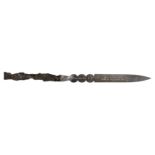 * Letter opener. WWII letter opener made from shrapnel