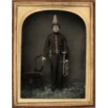 * Quarter-plate ambrotype of a young bandsman, by R[ichard] B[ritton] Bustin, Hereford, c.1858