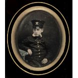 * Quarter-plate ambrotype of a young boy in uniform, late 1850s