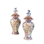 PAIR OF CONTINETAL DELFTWARE BALUSTER VASES AND COVERS