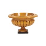 TURNED, CARVED AND STAINED BEECH URN IN NEOCLASSICAL TASTE