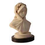 NORTHERN ITALIAN SCULPTED ALABASTER AND LATER MARBLE MOUNTED BUST OF A MAIDEN