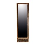 EMPIRE EBONISED AND PARCEL-GILT PIER MIRROR