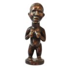KONGO WOODEN FIGURE OF A STANDING FEMALE
