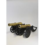 PAIR OF BRASS AND CAST IRON MODEL FIELD CANNONS, late 19th century