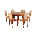 •MANNER OF LEON JALLOT: A FRENCH ART DECO SATINWOOD AND BURR ELM DINING SUITE
