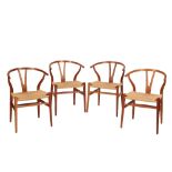 •HANS WEGNER FOR CARL HANSEN & SON: A SET OF FOUR "WISHBONE" CH24 DINING CHAIRS