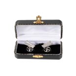 HOLLAND AND HOLLAND: A PAIR OF NOVELTY SILVER CUFFLINKS