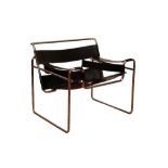 •AFTER MARCEL BREUER: A "WASSILY" CHROME ARMCHAIR