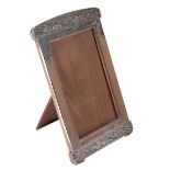 LIBERTY & CO: A SILVER ART NOUVEAU PHOTOGRAPH FRAME